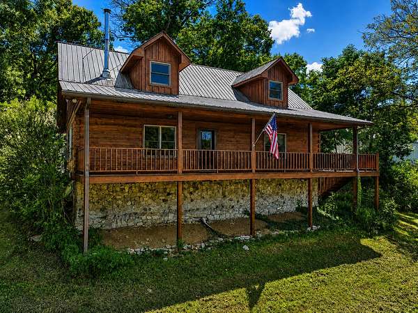 21.4 Acres of Recreational Land with Home for Sale in Pleasant Shade, Tennessee