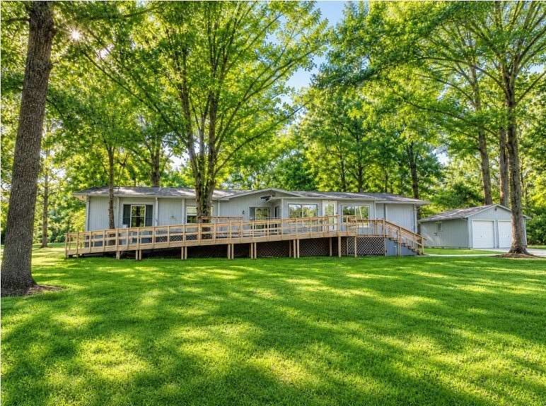 4.85 Acres of Land with Home for Sale in Gilmer, Texas
