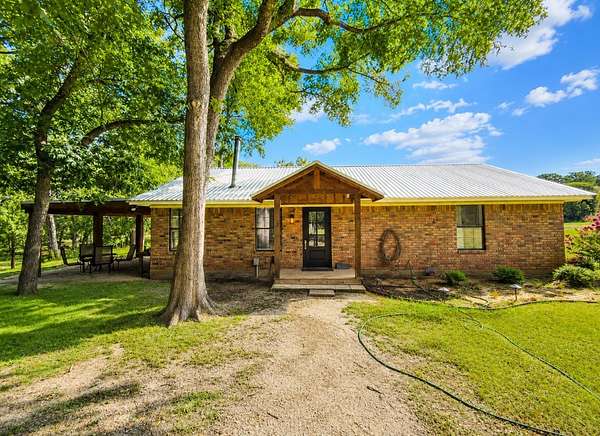 3 Acres of Land with Home for Sale in Aquilla, Texas