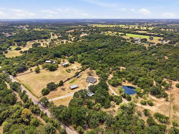 7 Acres of Land with Home for Sale in Granbury, Texas