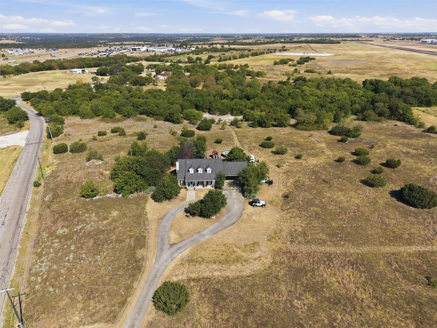 11 Acres of Land with Home for Sale in Cleburne, Texas