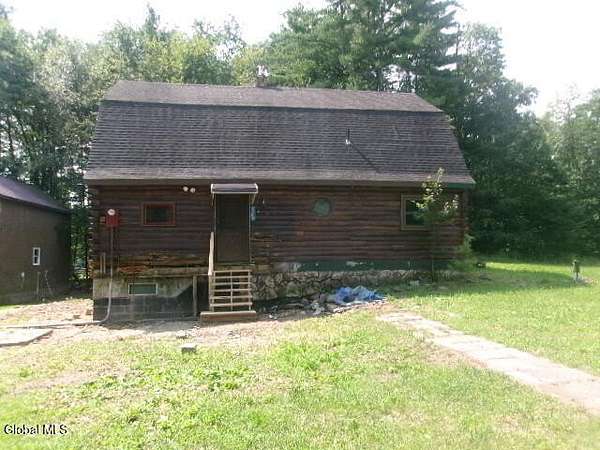 5.44 Acres of Land with Home for Auction in Hampton, New York