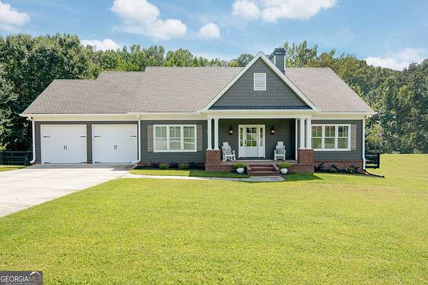 2.46 Acres of Land with Home for Sale in Cumming, Georgia