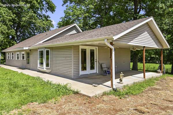 7.46 Acres of Land with Home for Sale in Clever, Missouri