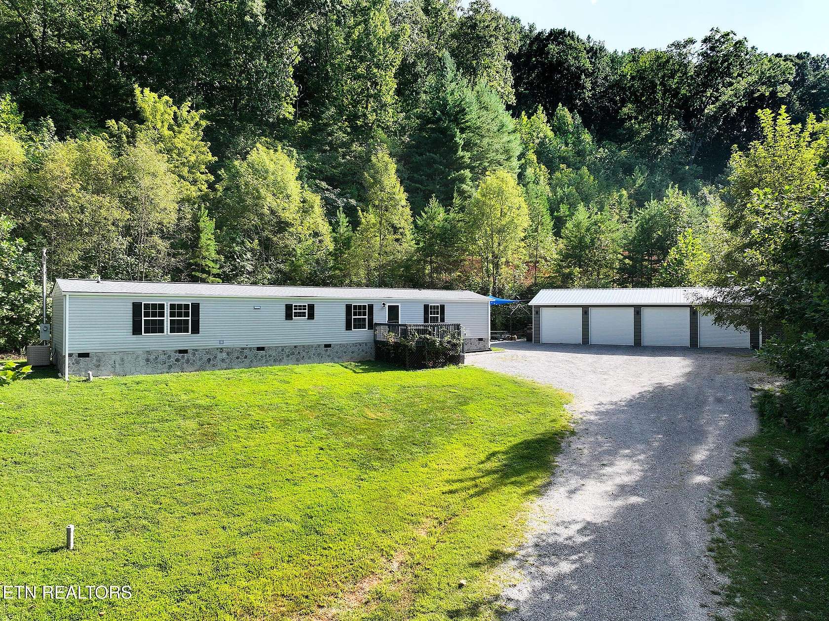 5.48 Acres of Land with Home for Sale in Knoxville, Tennessee