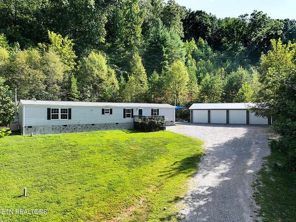 5.48 Acres of Land with Home for Sale in Knoxville, Tennessee