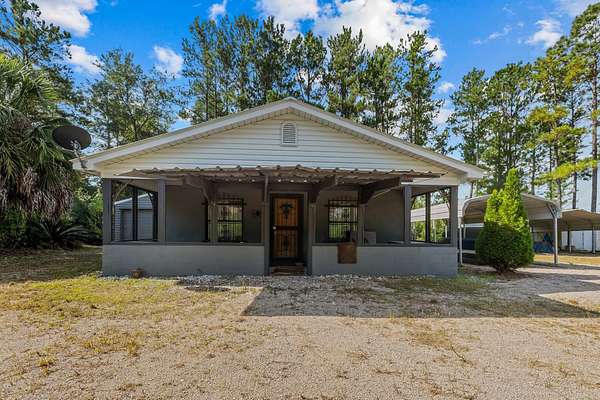 20.7 Acres of Land with Home for Sale in Sopchoppy, Florida