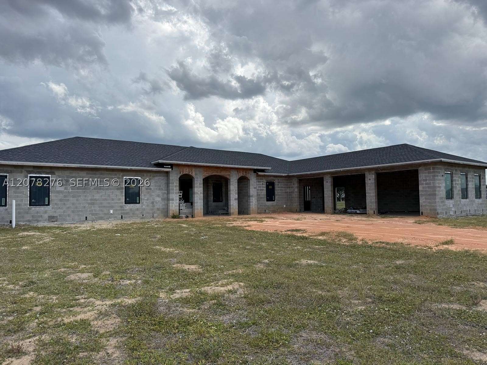 1.83 Acres of Land with Home for Sale in Lake Placid, Florida