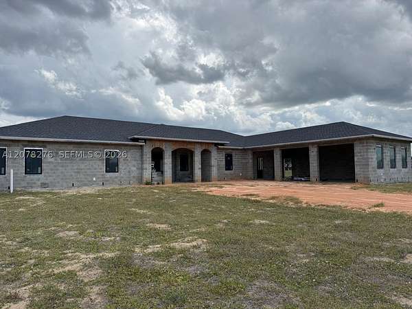 1.83 Acres of Land with Home for Sale in Lake Placid, Florida