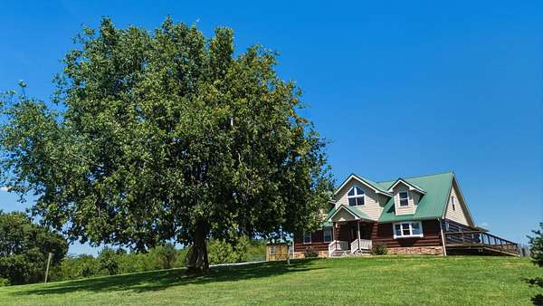 16.4 Acres of Land with Home for Sale in Maysville, Kentucky