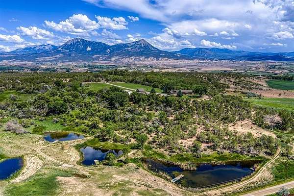 37 Acres of Land with Home for Sale in Hotchkiss, Colorado