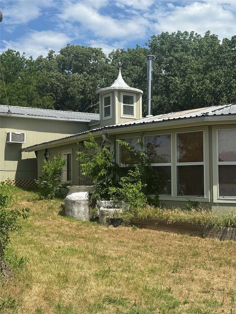 6.56 Acres of Land with Home for Sale in Gainesville, Texas