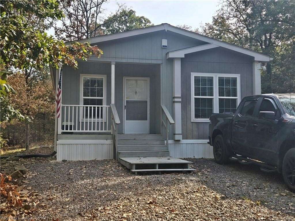 6.13 Acres of Land with Home for Sale in Booneville, Arkansas