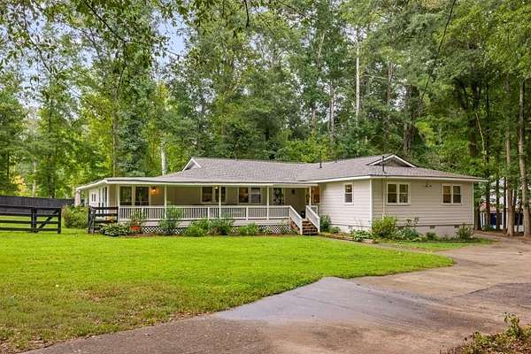 8.48 Acres of Land with Home for Sale in Woodstock, Georgia