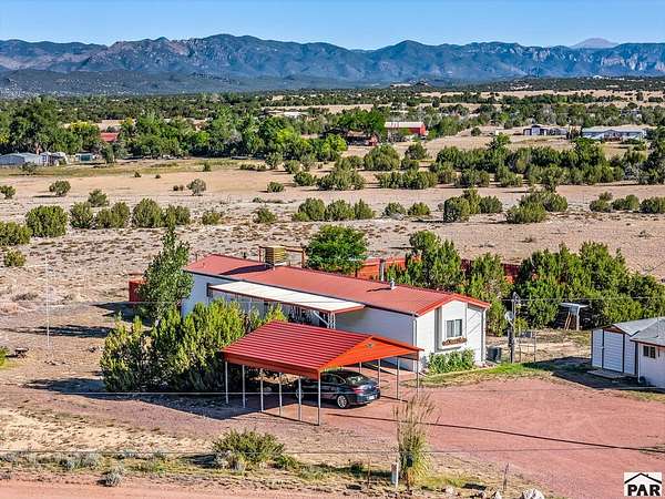 4.88 Acres of Land with Home for Sale in Penrose, Colorado