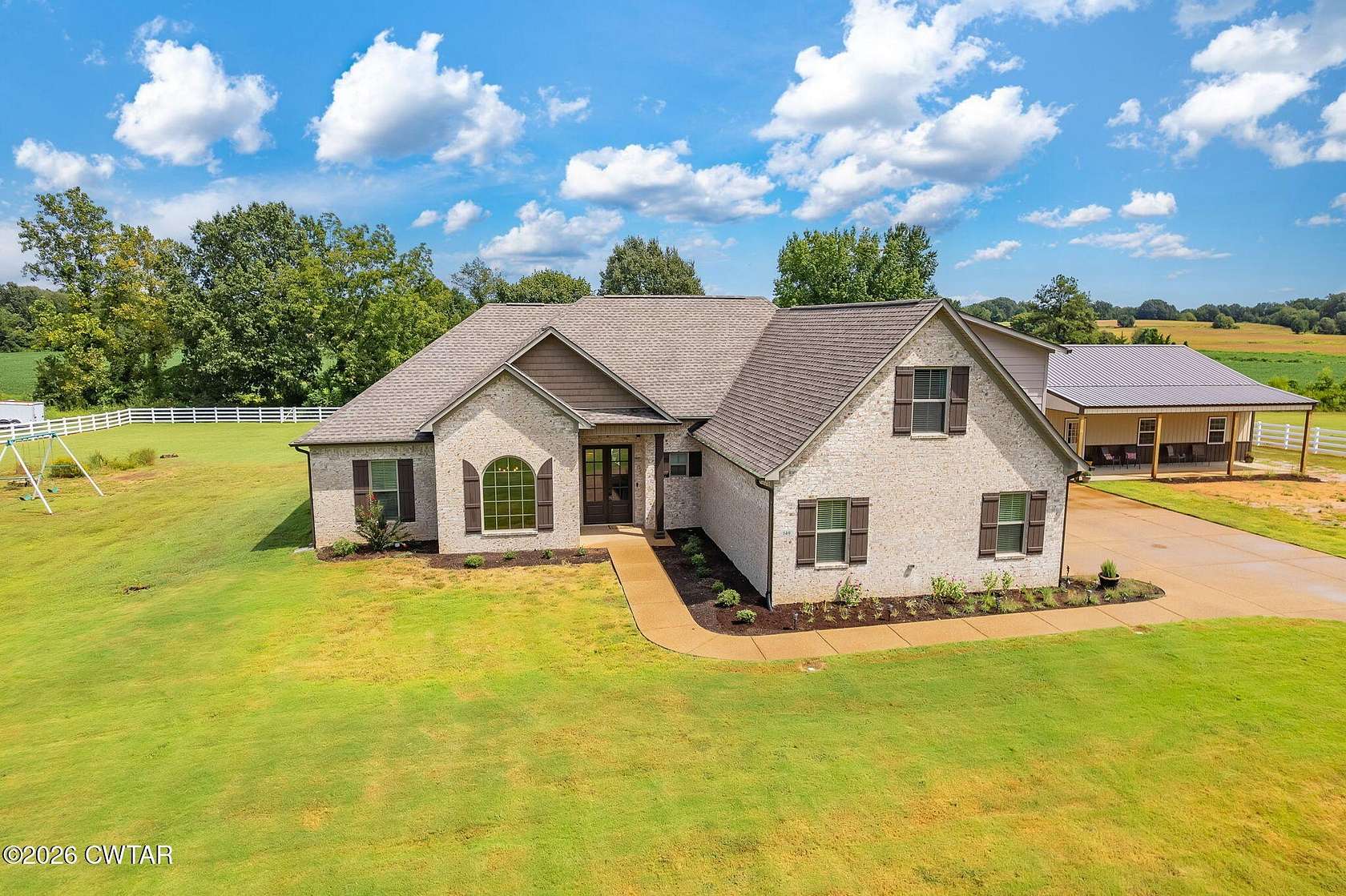 2 Acres of Land with Home for Sale in Gadsden, Tennessee