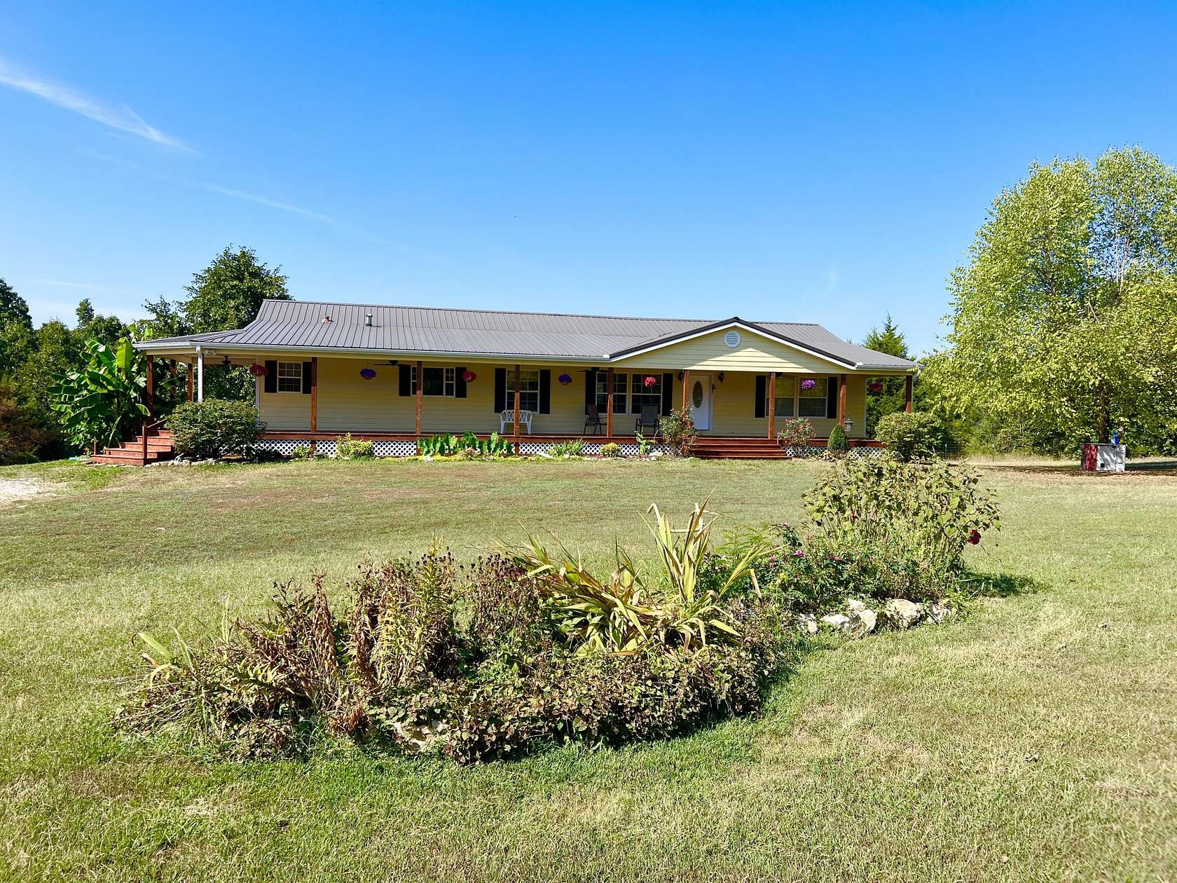 10.4 Acres of Land with Home for Sale in Mountain Grove, Missouri
