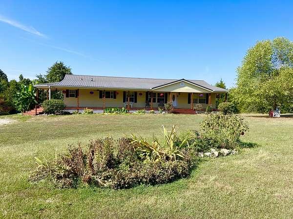 10.4 Acres of Land with Home for Sale in Mountain Grove, Missouri