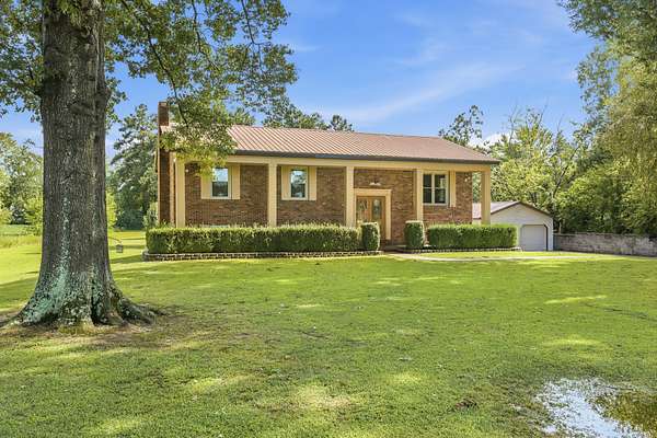 1.8 Acres of Land with Home for Sale in Huntingdon, Tennessee