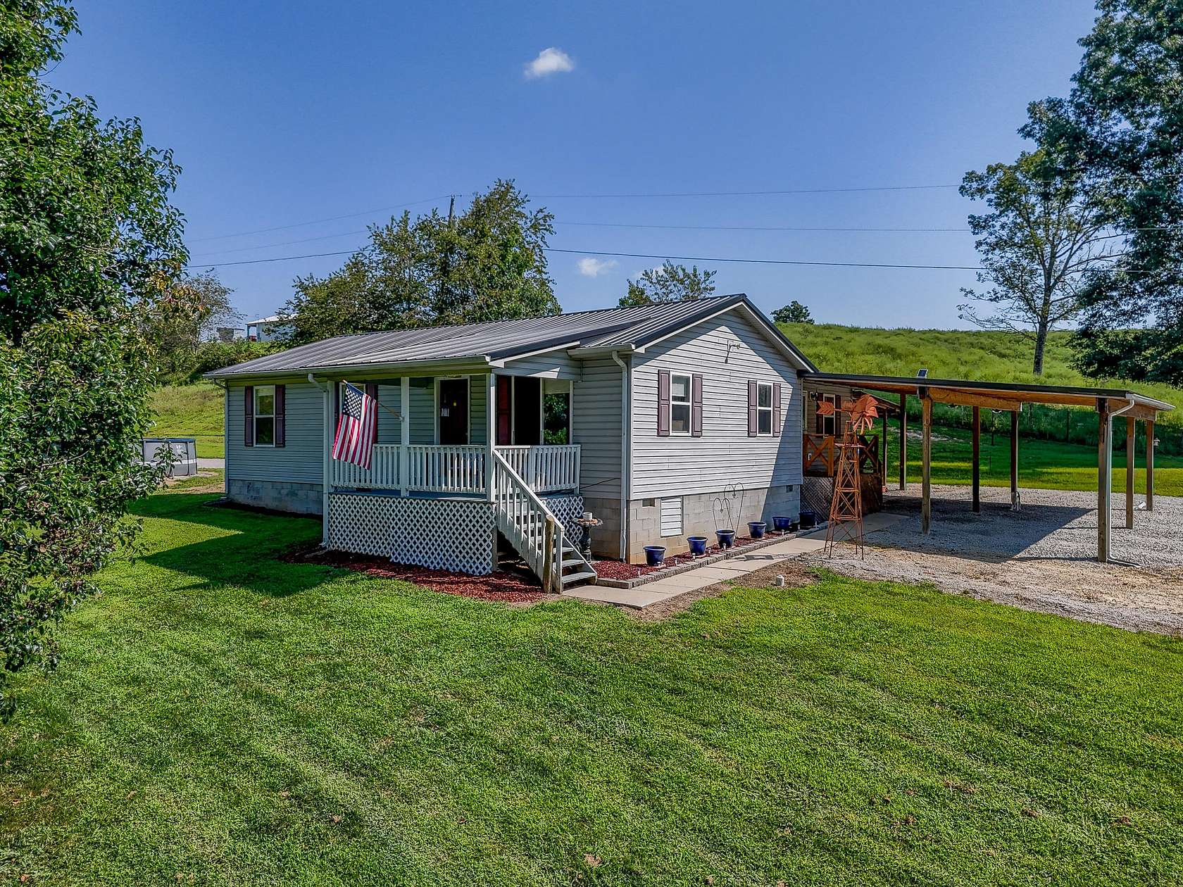 4.8 Acres of Land with Home for Sale in Olive Hill, Kentucky