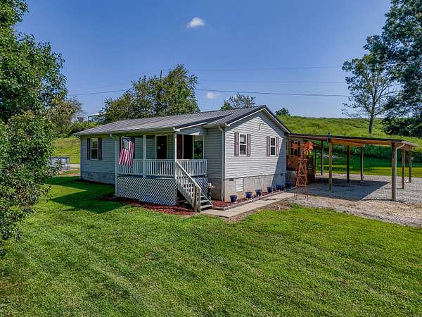 4.8 Acres of Land with Home for Sale in Olive Hill, Kentucky