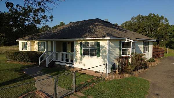 14.3 Acres of Land with Home for Sale in Frierson, Louisiana