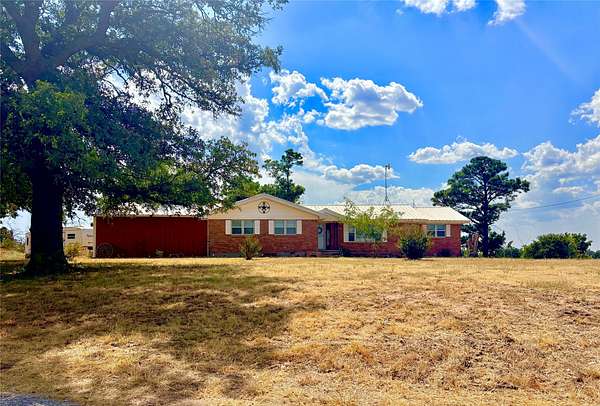 80 Acres of Agricultural Land with Home for Sale in Eastland, Texas