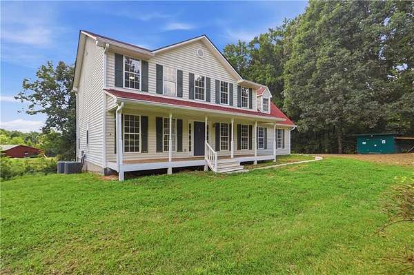 1.85 Acres of Land with Home for Sale in Canton, Georgia