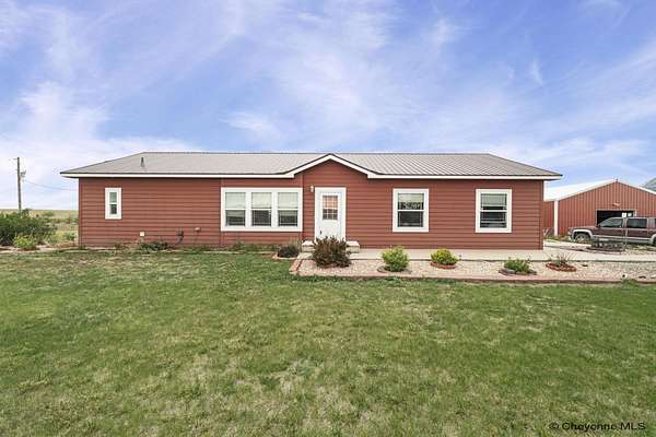 160 Acres of Agricultural Land with Home for Sale in Burns, Wyoming