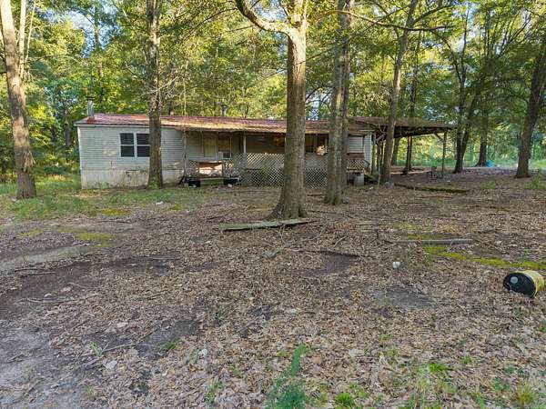7.76 Acres of Land with Home for Sale in Georgetown, Arkansas