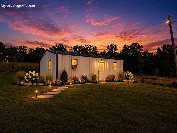5.84 Acres of Land with Home for Sale in Mansfield, Missouri