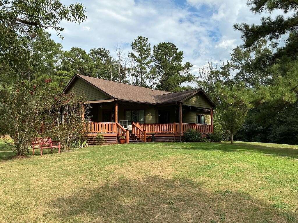 3.88 Acres of Land with Home for Sale in Highland Home, Alabama