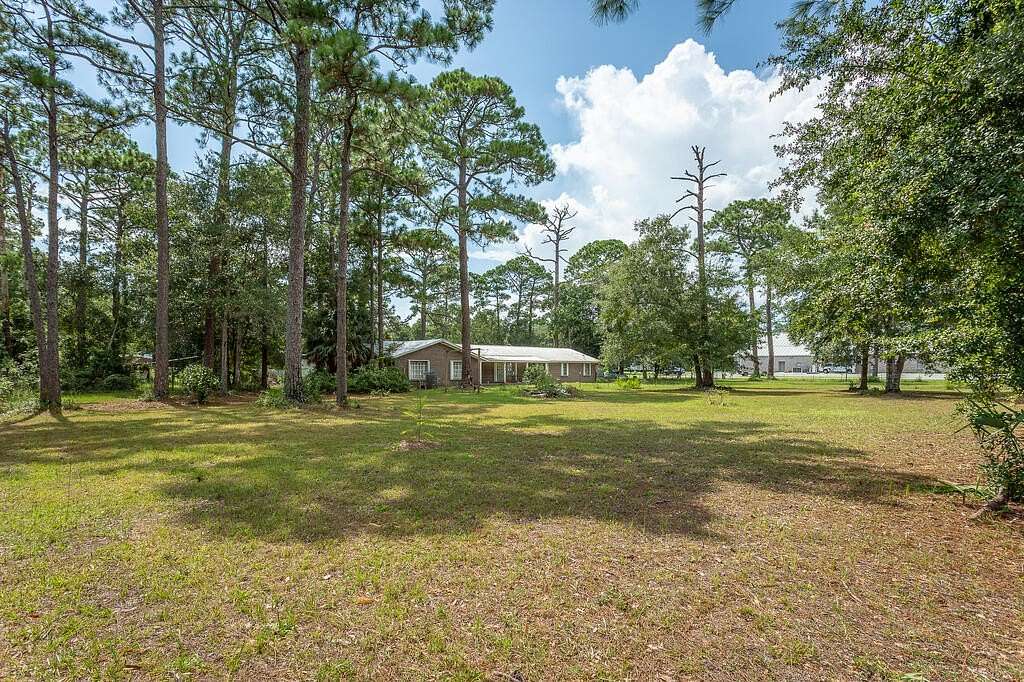 1.65 Acres of Land with Home for Sale in Apalachicola, Florida