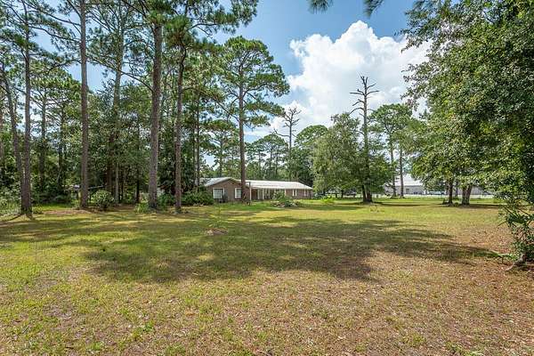 1.65 Acres of Land with Home for Sale in Apalachicola, Florida