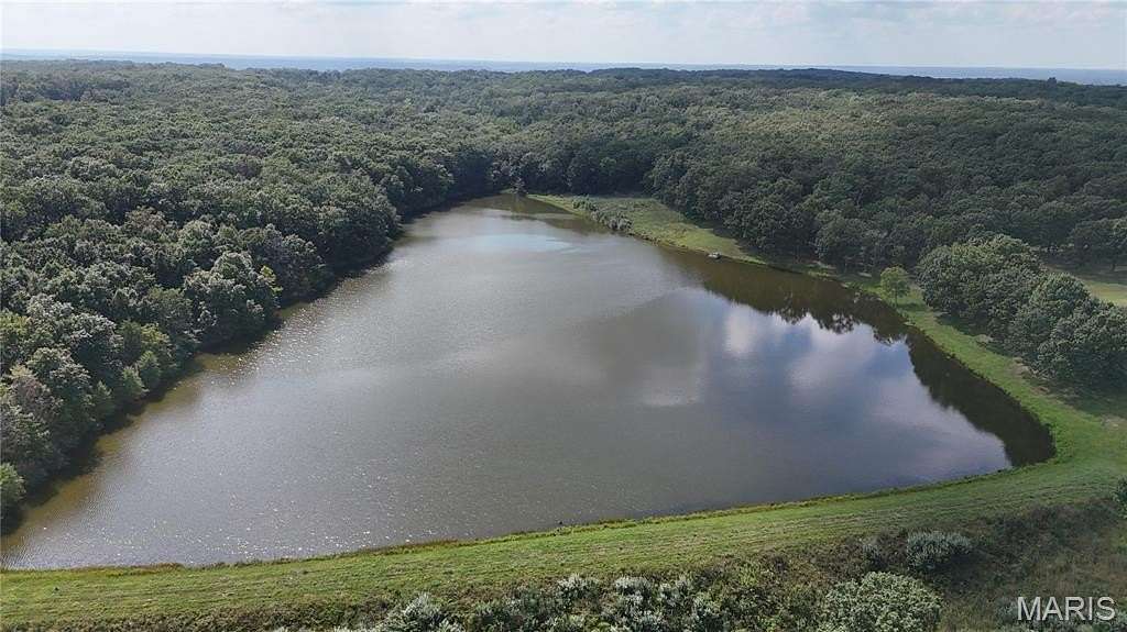86.4 Acres of Land with Home for Sale in Belle, Missouri