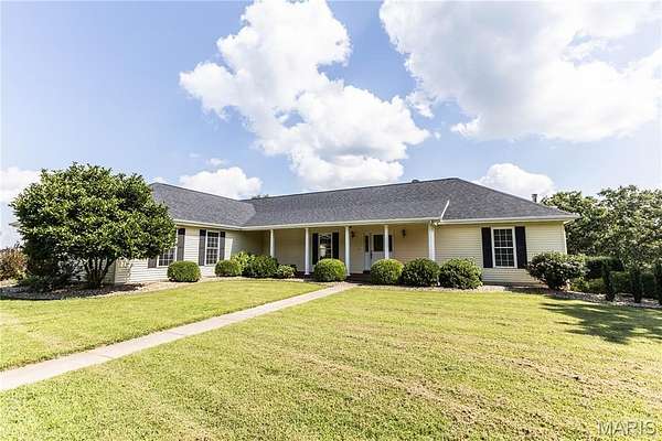 86.4 Acres of Land with Home for Sale in Belle, Missouri