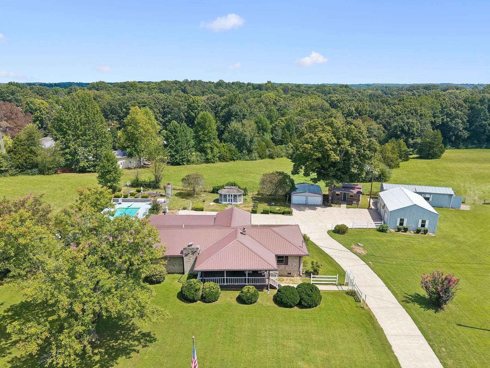 8.5 Acres of Land with Home for Sale in Burns, Tennessee