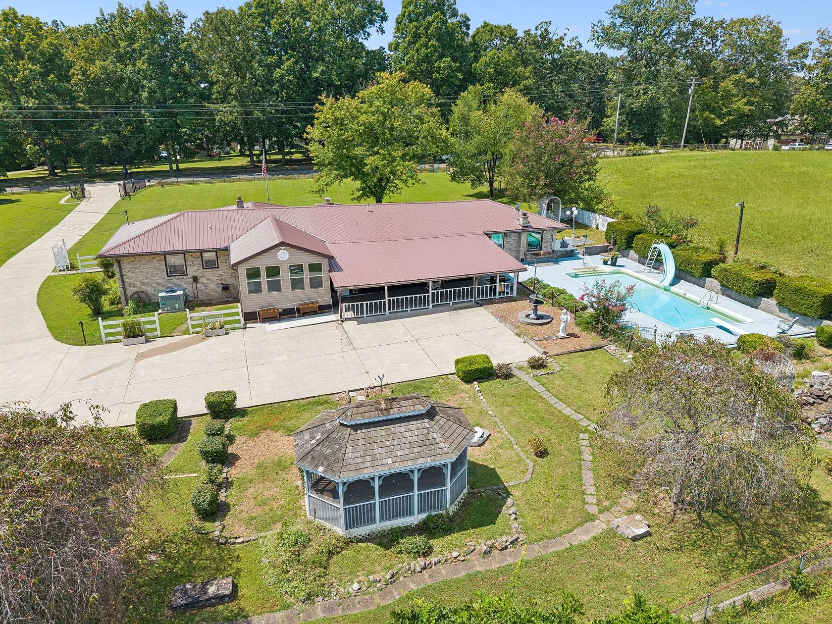 8.5 Acres of Land with Home for Sale in Burns, Tennessee