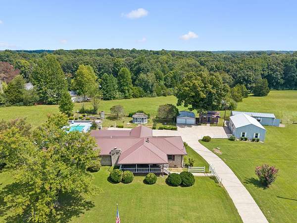 8.5 Acres of Land with Home for Sale in Burns, Tennessee