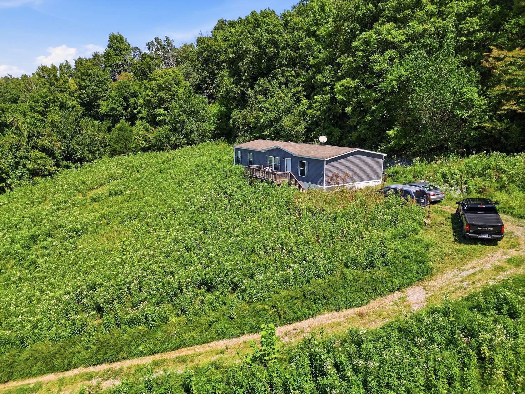 12.9 Acres of Land with Home for Sale in Dixon Springs, Tennessee