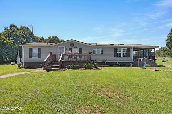 9.7 Acres of Land with Home for Sale in Humboldt, Tennessee