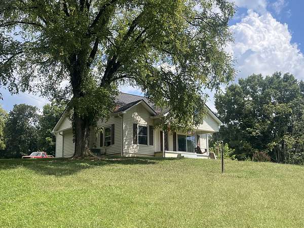 7.2 Acres of Land with Home for Sale in Pleasant Shade, Tennessee