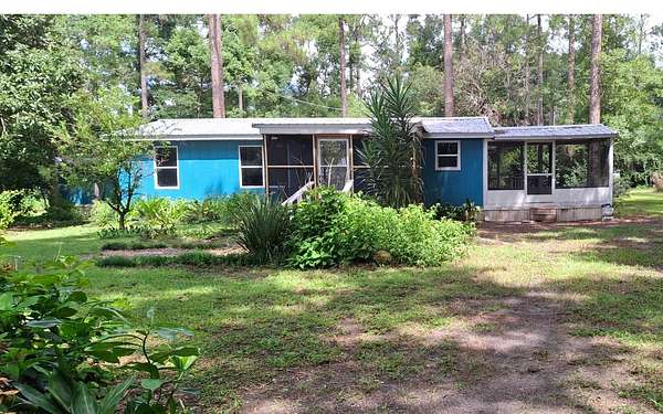 2 Acres of Land with Home for Sale in O'Brien, Florida