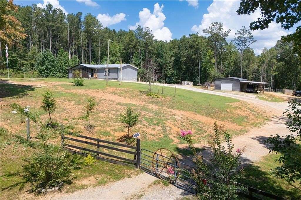 4.1 Acres of Land with Home for Sale in Waco, Georgia