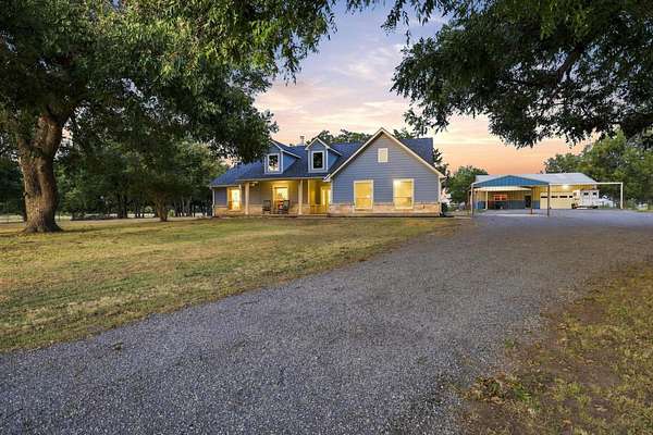 46 Acres of Land with Home for Sale in Wolfe City, Texas