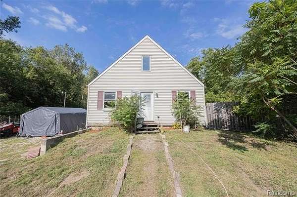 2.84 Acres of Land with Home for Sale in Sumpter Township, Michigan