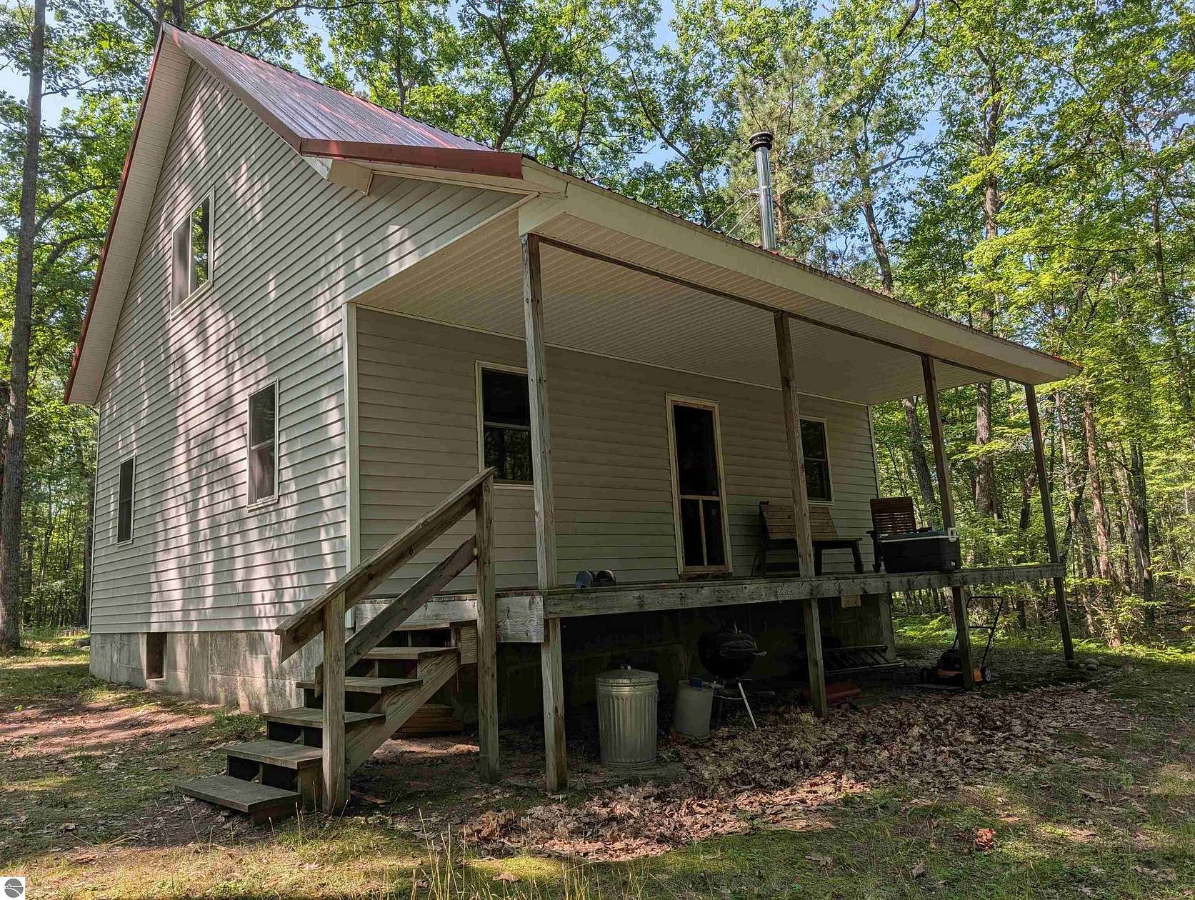 10 Acres of Land with Home for Sale in Barton City, Michigan