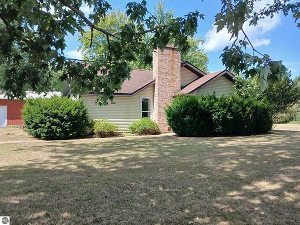 15.2 Acres of Recreational Land with Home for Sale in Coleman, Michigan