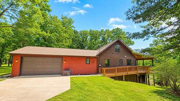 20.6 Acres of Recreational Land with Home for Sale in Twin Lake, Michigan