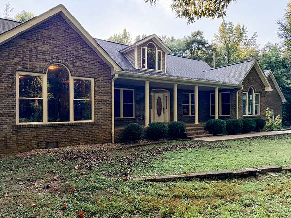 6.2 Acres of Land with Home for Sale in Cottontown, Tennessee